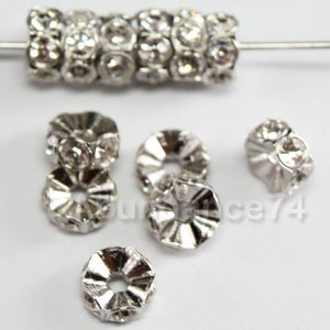 12 pcs Swarovski Crystal 7mm 4720 Rondelle SILVER spacer Finding w Clear Crystal beads ( Clearance Sale )