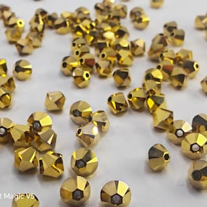Swarovski Crystal 5328  Xilion Bicone Beads AURUM 2X select sizes - 3mm ,4mm and 6mm