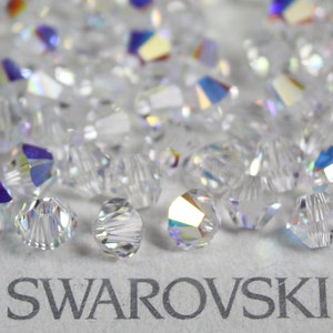 Swarovski Elements Crystal Xilion Crystal CLEAR AB Bicone Beads 5301 5328 3mm, 4mm, 5mm, 6mm, 8mm and 10mm -  (Choose Quantity and Size)