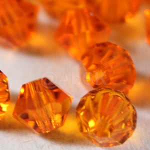 Swarovski Crystal Bicone Beads 5301 Xillion SUN - Available in 3mm, 4mm and 5mm