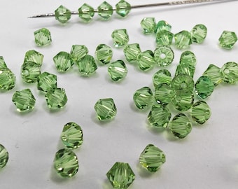 Swarovski Crystal BICONE beads 5328 5301 PERIDOT- Available in 3mm, 4mm, 5mm, 6mm and 8mm ( select Quantity and sizes )
