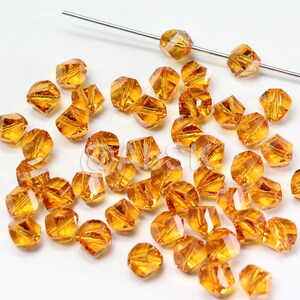 Swarovski Crystal Faceted TOPAZ Helix Beads 5020 - Select 3mm, 4mm, 6mm and 8mm Wholesale Jewelry Supplies Beads (Select Sizes and Quantity)