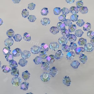 Swarovski Crystal Bicone Beads 5328 5301 Xillion Color : Light Sapphire Shimmer 2X , select quantity - Available in 3mm, 4mm,5mm and 6mm