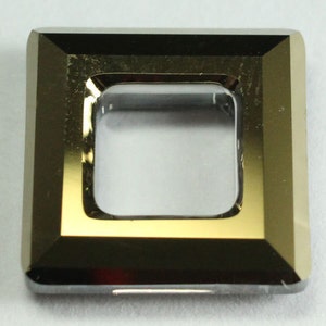 May include: A square-shaped, gold-toned metal frame with a clear glass center. The frame has a beveled edge and a polished finish.