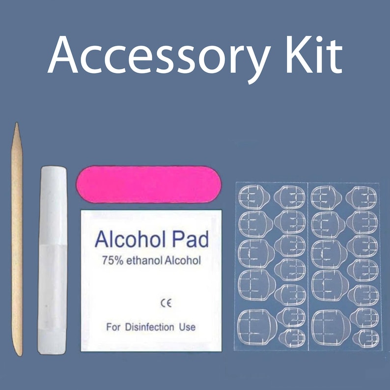 May include: An accessory kit for nail application, featuring a wooden cuticle stick, a white glue tube, a pink emery board, an alcohol pad, and a sheet of nail adhesive tabs. The text "Accessory Kit" is displayed at the top.