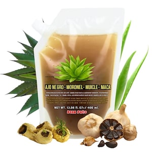 May include: A clear pouch filled with a brown liquid, featuring a green plant graphic and text. The image includes aloe vera leaves, garlic, and maca root. The pouch is labeled with text including "AJO NEGRO - MORONEL - MUICLE - MACA" and "NET WT. 13.56 fl. oz./ 400 ml."