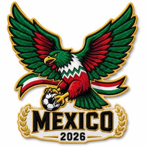 May include: Embroidered patch featuring a green, red, and white eagle with outstretched wings, clutching a soccer ball. The word "MEXICO" is displayed below, along with the year "2026", all in a gold frame.