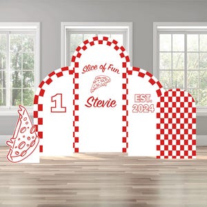 May include: A white and red pizza-themed party backdrop with the text "Slice of Fun", a pizza slice graphic, the name "Stevie", the number "1", and "EST. 2024". The backdrop has a checkered pattern.