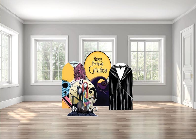 May include: Three decorative party backdrop panels featuring The Nightmare Before Christmas themes. The panels display Jack Skellington, Sally, and Zero, a yellow moon with the text Happy Birthday Catalina, and a black pinstripe suit pattern.