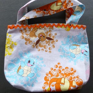 Monedero forrado para niña con personaje rosa o naranja; monedero infantil; regalo para niña; monedero pequeño