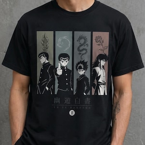 May include: A black short-sleeve t-shirt featuring a graphic print of four anime characters from Yu Yu Hakusho. Each character is framed in a vertical panel with a unique symbol above them. The text Yu Yu Hakusho is printed below the panels.