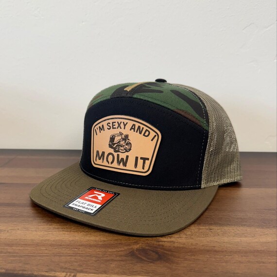 I'm Sexy and I Mow It Leather Patch Hat Trucker Style (Adjustable Snapback)