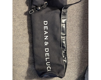 Sac fourre-tout Dean and Deluca en toile et similicuir noirs avec cordon de serrage
