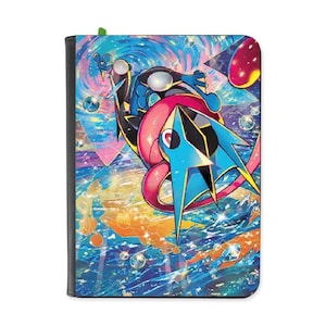 May include: A rectangular trading card binder featuring a vibrant, multi-coloured illustration of a blue and black creature with a pink scarf-like element. The background displays a swirling cosmic pattern with bubbles, stars, and geometric shapes.