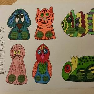May include: Hand-drawn illustration of six colorful pets, including a dog, cat, fish, rodent, bird, and lizard. Each pet has a unique design and the text "cut out circle" on its body. The word "PETS" is written vertically.
