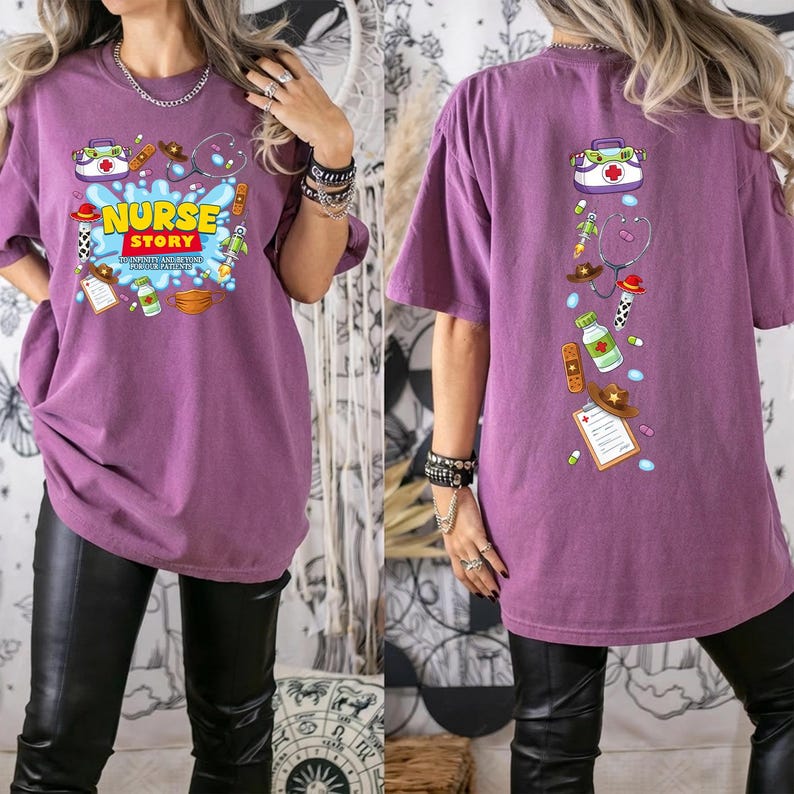 May include: A purple short-sleeve t-shirt featuring a graphic print. The front displays the text NURSE STORY TO INFINITY AND BEYOND FOR OUR PATIENTS with medical and space-themed icons. The back shows a vertical arrangement of the same icons.