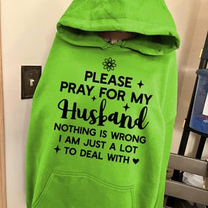 May include: A rustic wooden sign with the text "Welcome to our home" in white lettering. The sign features a distressed finish and a simple, inviting design, perfect for a front porch or entryway.