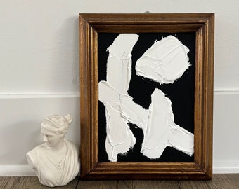 Vintage gold wood frame with new black and white abstract painting, neutrals