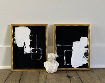Pair, two vintage small gold frames with black and white abstract paintings