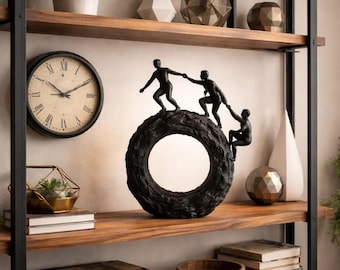Escultura abstracta de trabajo en equipo, figura moderna de escalada, estatua de resina negra para decoración de oficina.