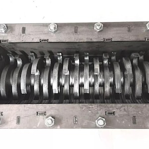 Progettazione di un trituratore di livello industriale per il riciclaggio e la preparazione al recupero di metalli preziosi (Download digitale)