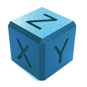 May include: A blue cube with the letters X, Y, and Z etched into its sides. The cube has a textured surface and a slightly beveled top edge. The letters are in a dark, contrasting color.