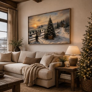May include: A rectangular wall art print featuring a snowy winter landscape at sunset. The scene depicts a large evergreen tree in the foreground, a wooden fence, and a small cabin in the distance, all set against a soft, golden-hued sky.