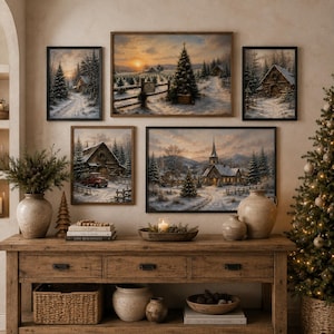 May include: A gallery wall featuring five framed winter landscape prints above a wooden console table. The prints depict snowy scenes with cabins, a church, and pine trees at sunset. The console holds ceramic vases, a bowl with a candle, and books.