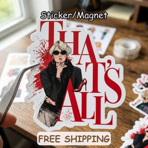 May include: A white sticker/magnet with the text "THAT'S ALL" in red, featuring a stylish woman in sunglasses and a black coat. The design includes a red high heel and red splatter accents.