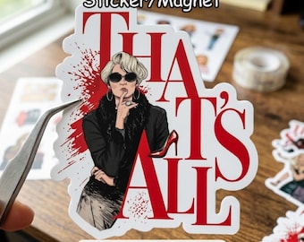 May include: A white sticker/magnet with the text "THAT'S ALL" in red, featuring a stylish woman in sunglasses and a black coat. The design includes a red high heel and red splatter accents.