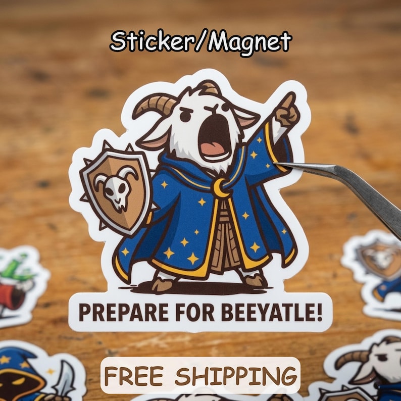 May include: A sticker or magnet showing a cartoon goat in a blue robe with gold details, holding a shield. The text "PREPARE FOR BEEYATLE!" is below the goat. The words "Sticker/Magnet" are at the top.