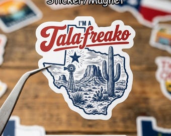 May include: A die-cut sticker shaped like the state of Texas featuring a blue ink illustration of a desert landscape with a windmill, a saguaro cactus, and a star. The text "I'M A Tala-freako" is printed in bold red script across the top.