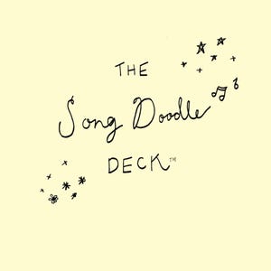 May include: A light yellow background with the words "THE Song Doodle DECK™" in black handwritten font. The image includes doodles of stars, musical notes, and flowers.