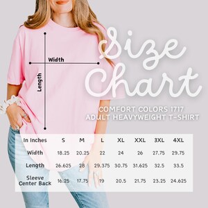 a woman wearing a pink t-shirt, with a size chart and measurements displayed.
