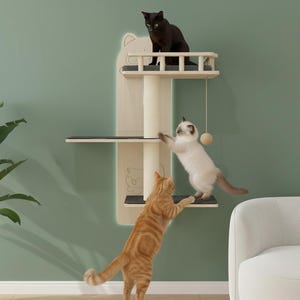 May include: A wooden cat tree with multiple levels, a scratching post, and a dangling toy. Three cats are interacting with the cat tree. One black cat is on the top level, a white cat is climbing, and an orange tabby is jumping.