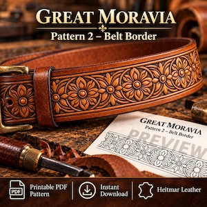 May include: A brown leather belt featuring an embossed floral pattern with a brass buckle. A white card displays the text GREAT MORAVIA Pattern 2 – Belt Border and a line drawing of the design. A metal tool rests on the surface nearby.