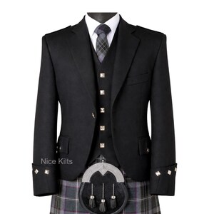 May include: A black kilt outfit, comprising a jacket, waistcoat, and kilt. The jacket features silver detailing on the cuffs and lapels. The kilt is a grey and purple plaid. The outfit is displayed on a mannequin. The text "Nice Kilts" is visible.