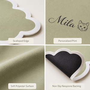 May include: A sage green cloud-shaped mat featuring a white scalloped edge and a soft polyester surface. The mat includes a personalized print of the name Mila next to a cat illustration and has a black non-slip neoprene backing.
