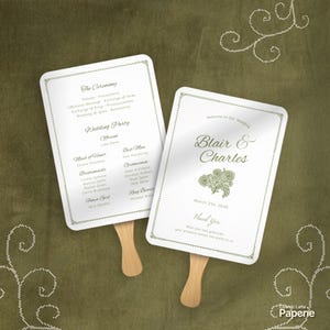 May include: Two white rectangular wedding program fans with wooden handles. One side displays the ceremony order and wedding party names. The other side features the names Blair & Charles, a floral illustration, and the date March 21st, 2030.