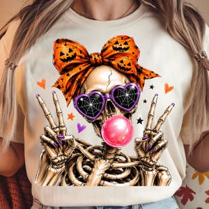 skeleton girl blowing a pink bubble halloween sublimation design