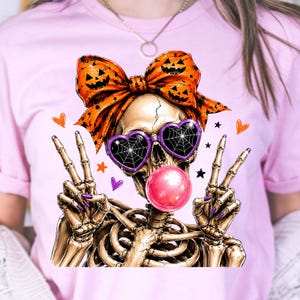 spooky skull girl wearing pumpkin halloween bow png