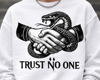 May include: White sweatshirt featuring a black and white graphic of two hands shaking, intertwined with a snake. The text "TRUST NO ONE" is printed below the graphic. The sweatshirt has a crew neck and long sleeves.