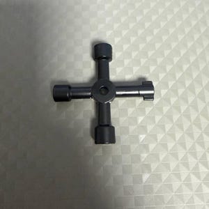 May include: A set of three ceramic mugs with a speckled, matte finish. The mugs are in shades of cream, light gray, and dark gray. Each mug has a simple, minimalist design and a rounded handle.