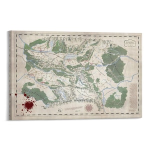 May include: A canvas print of a fantasy map, featuring a detailed illustration of a fictional land. The map is colored in shades of beige, green, and blue, with text in a stylized font. A blood-red stain is visible on the lower left corner.