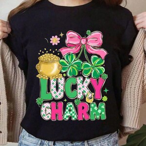 Lucky Charm St. Patrick's Day Shirt – Cute Coquette Pink Bow Tee – Aesthetic Pot of Gold & Shamrock Graphic T-Shirt for Women