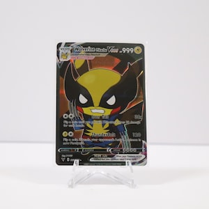 May include: A collectible trading card featuring Wolverine in a cartoon style. The card has a black background with yellow and blue accents. The card is displayed on a clear plastic stand.
