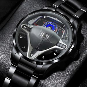 May include: A set of three ceramic mugs with a speckled, matte finish in cream, light grey, and dark grey. Each mug has a simple, minimalist design and a rounded handle.