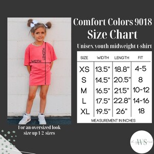 May include: A young person wearing a coral-colored t-shirt, with a size chart for a unisex youth midweight t-shirt. The chart shows measurements in inches for sizes XS to XL, with width ranging from 13.5" to 19.5" and length from 18.8" to 26".