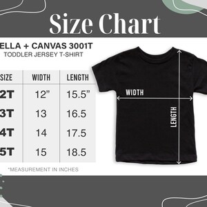 May include: Size chart for Bella + Canvas 3001T toddler jersey t-shirts. The chart shows the width and length measurements in inches for sizes 2T, 3T, 4T, and 5T.