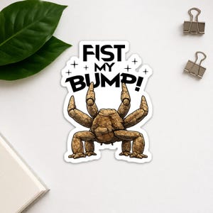 May include: A sticker featuring a cartoonish, brown, crab-like creature with multiple segmented limbs. The sticker has the text "FIST MY BUMP!" in bold, black letters, with star accents.